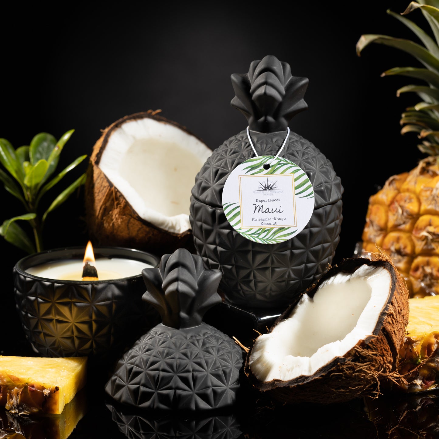 Candle in black pineapple jar scented with pineapple, mango and coconut milk. 